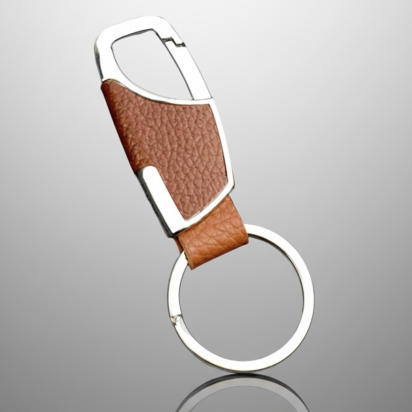 Brown leather keychain with silver accents on a white background