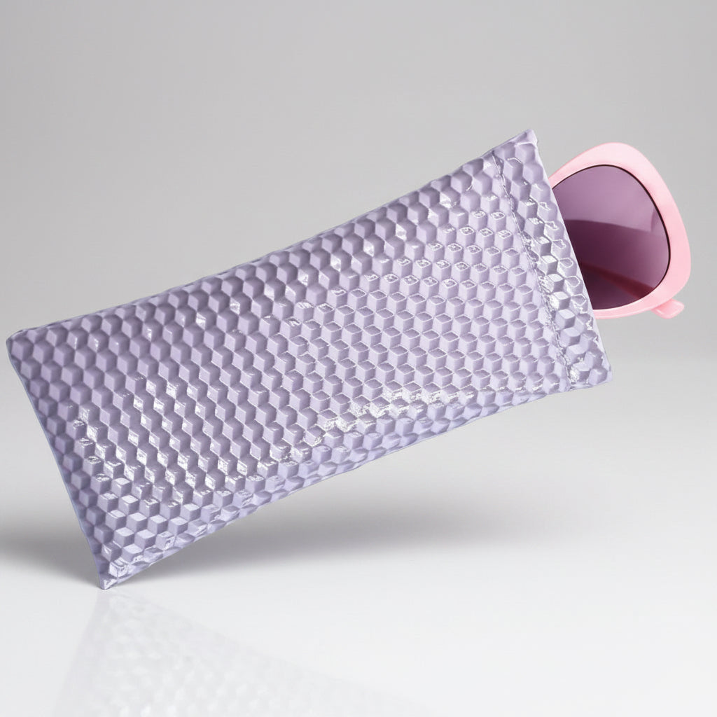A lightly textured, lavender-colored eyeglasses case that is open, showing the contents inside, which appears to be a pair of eyeglasses.