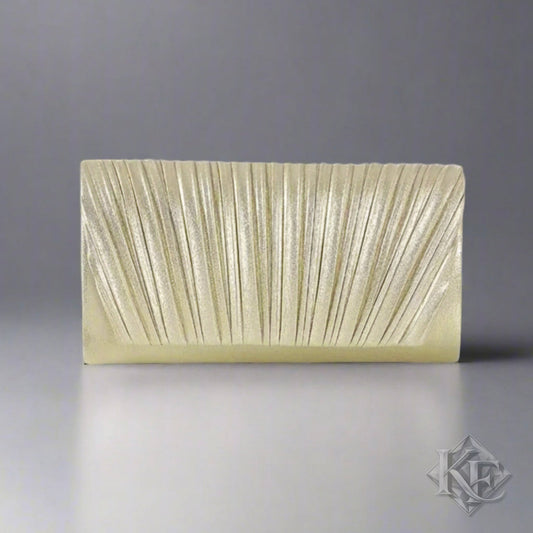 Gold clutch bag on a gray background
