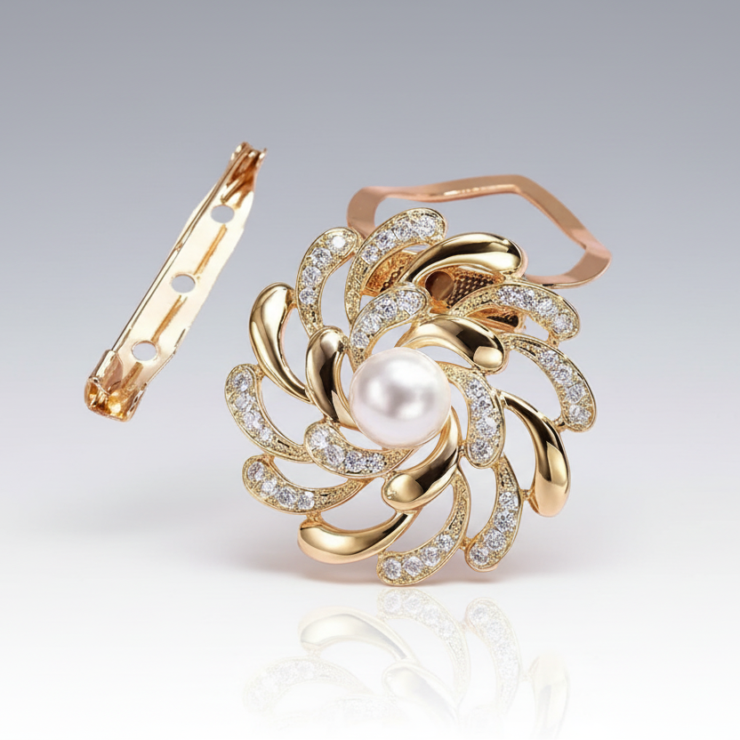 Gold hair clip with pearl and gemstone design on a light gray background