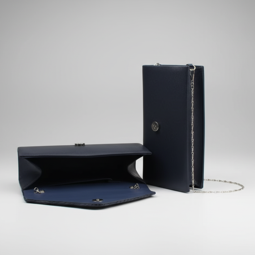 Blue clutch with silver chain on a white background