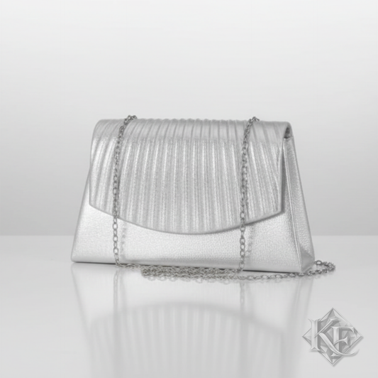 Silver clutch bag with chain strap on a white background