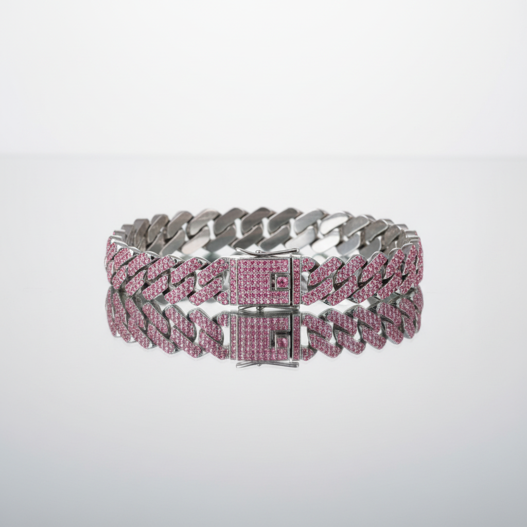 Silver bracelet with pink gemstones on a light gray background