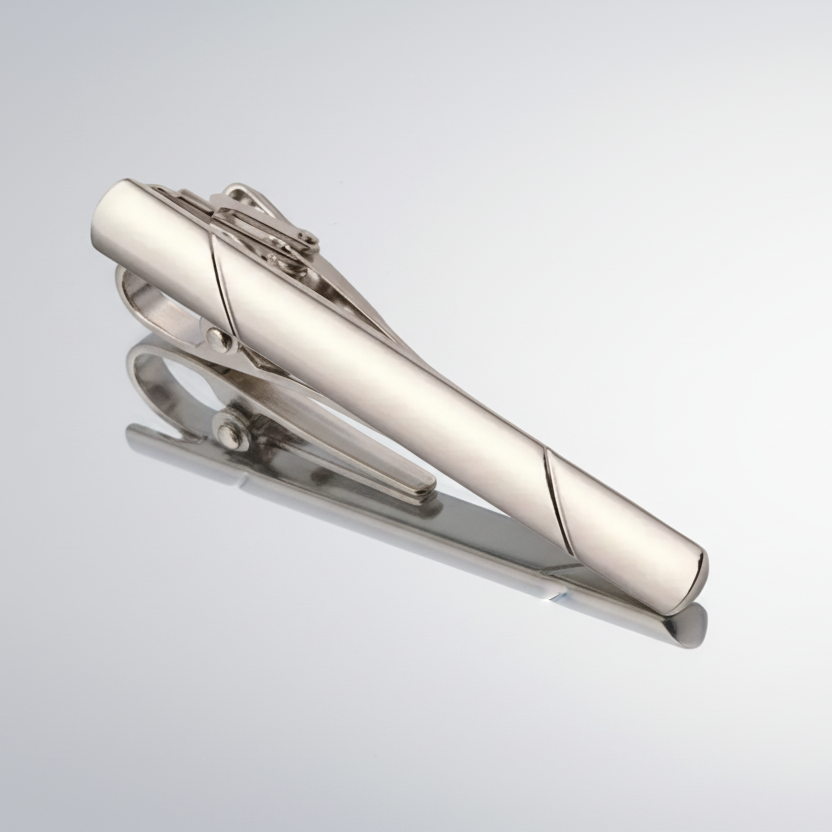 Silver tie clip on a white background