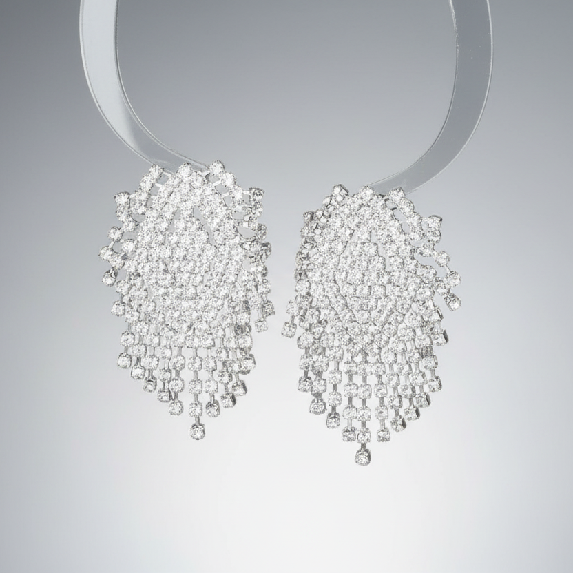 Diamond earrings on a gray background