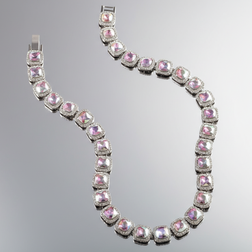 Necklace with iridescent gemstones on a gray background