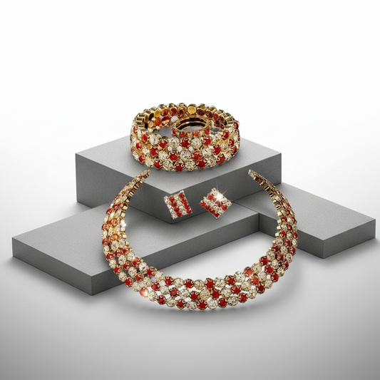 Jewelry set with necklace, bracelet, and ring on a gray platform