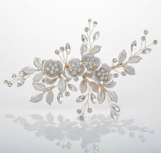 Decorative floral hairpiece with crystals on a light gray background