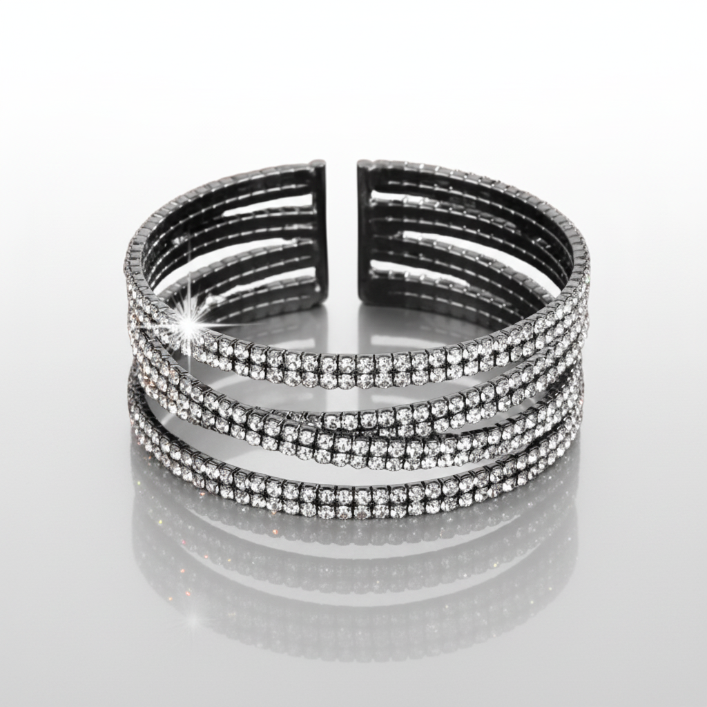 Black and silver bracelet with rhinestones on a white background