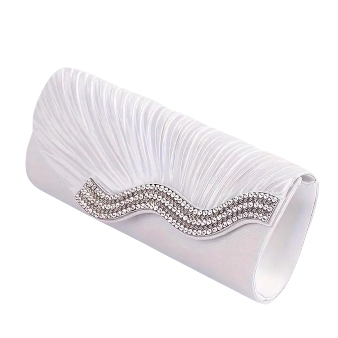 White clutch with decorative wave pattern and crystals on a white background