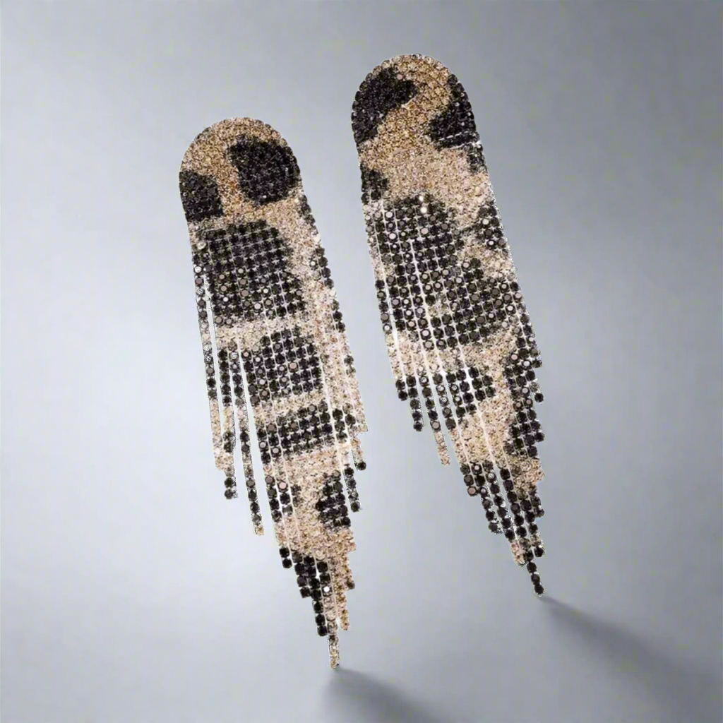 Pair of beaded earrings on a gray background