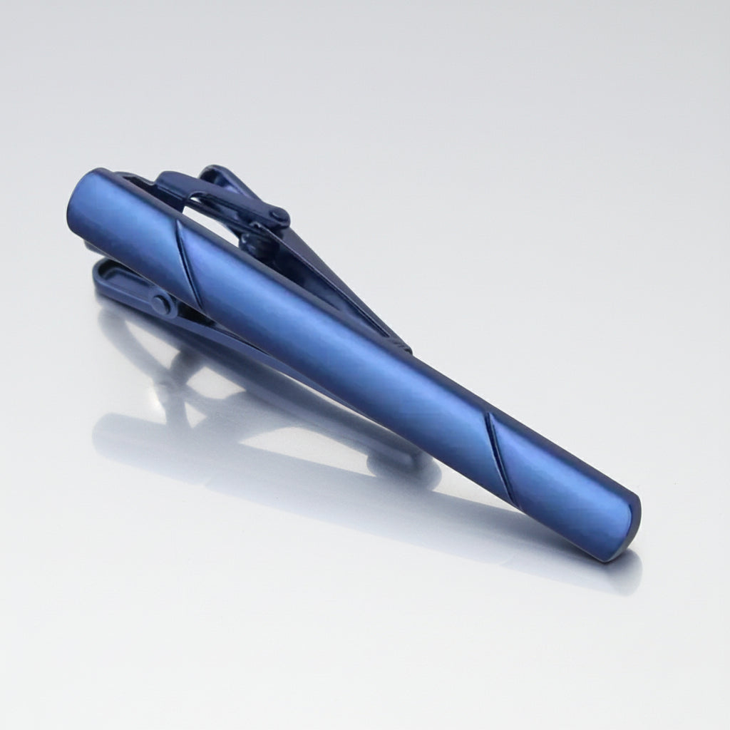 Blue tie clip on a white background