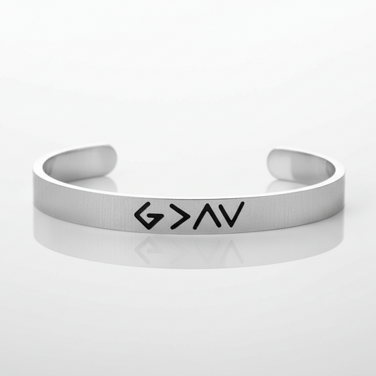 Silver bracelet with 'G > A V' engraving on a white background