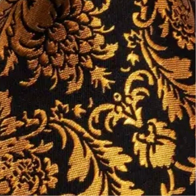 Gold floral pattern on black fabric
