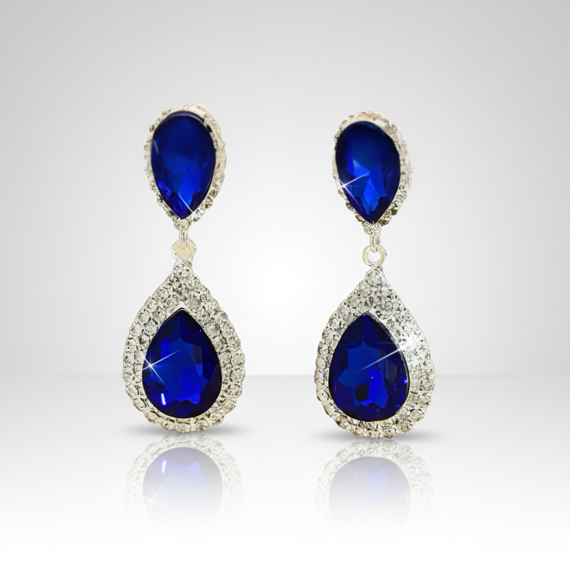 Pair of blue teardrop earrings on a white background