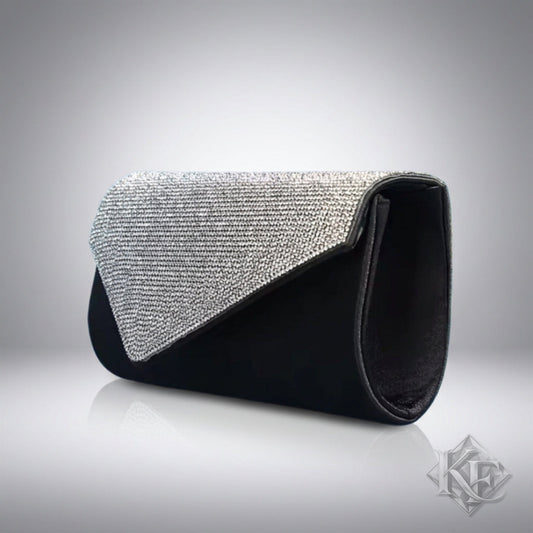 A black clutch purse with a sparkling silver rhinestone-embellished envelope flap, shown on a plain white background.
