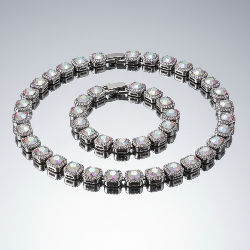 Luxury iridescent necklace and bracelet set on a reflective surface with a neutral background