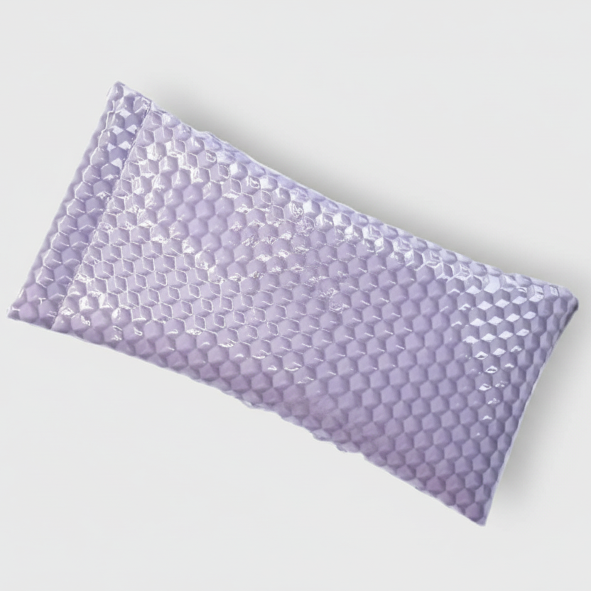 Purple bubble wrap on a light gray background