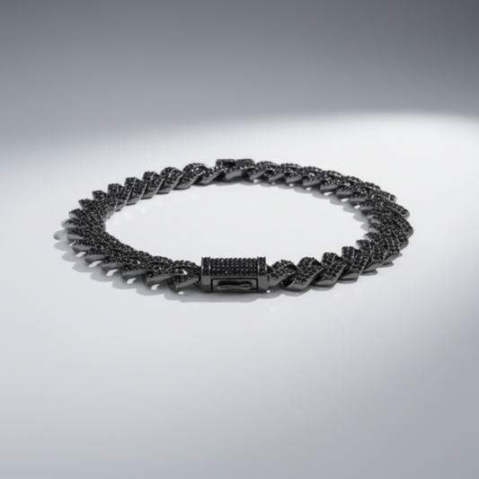 Black chain necklace on a gray background