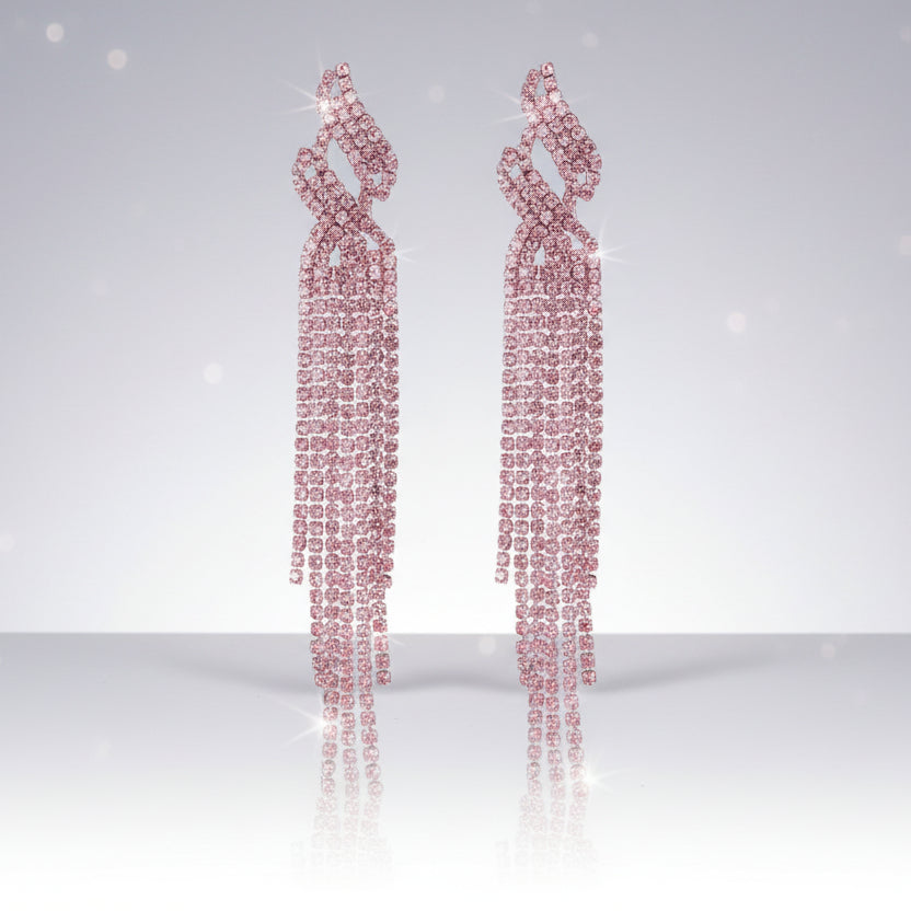 Pair of pink diamond earrings on a light gray background