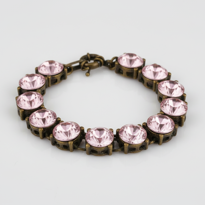 Bracelet with pink gemstones on a light gray background