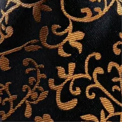 Close-up of black fabric with gold  pattern