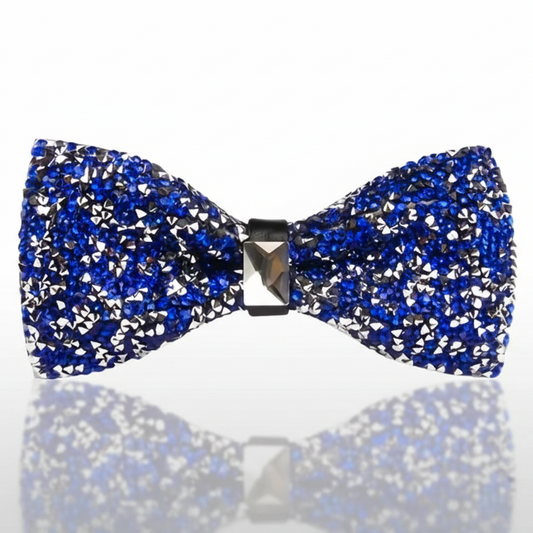 Blue and silver glittery bow tie on a white background