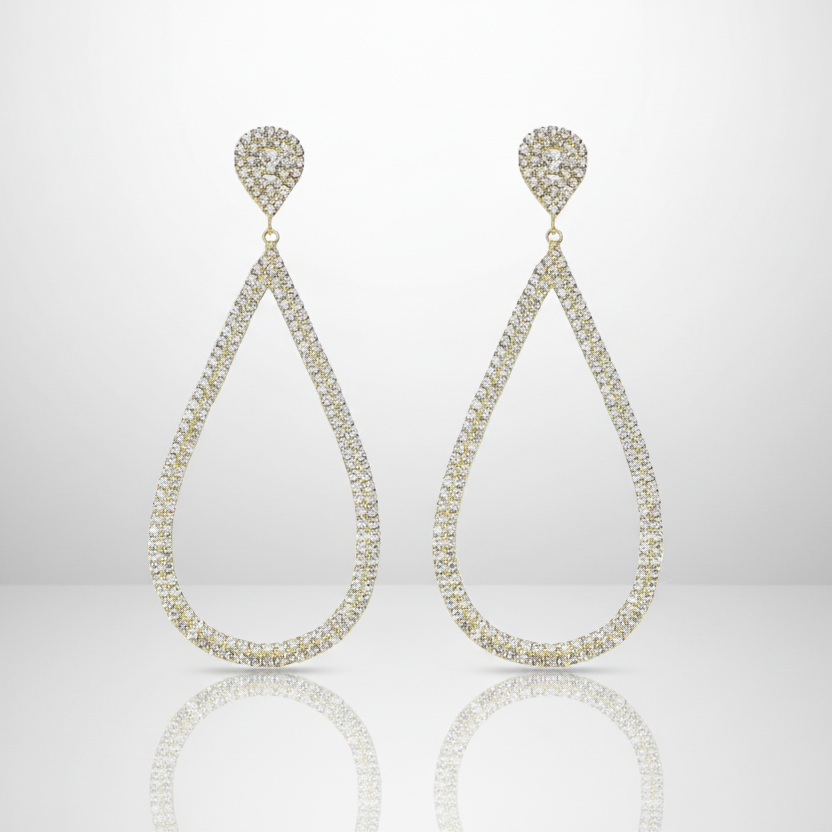 Teardrop-shaped earrings with crystal detailing on a white background